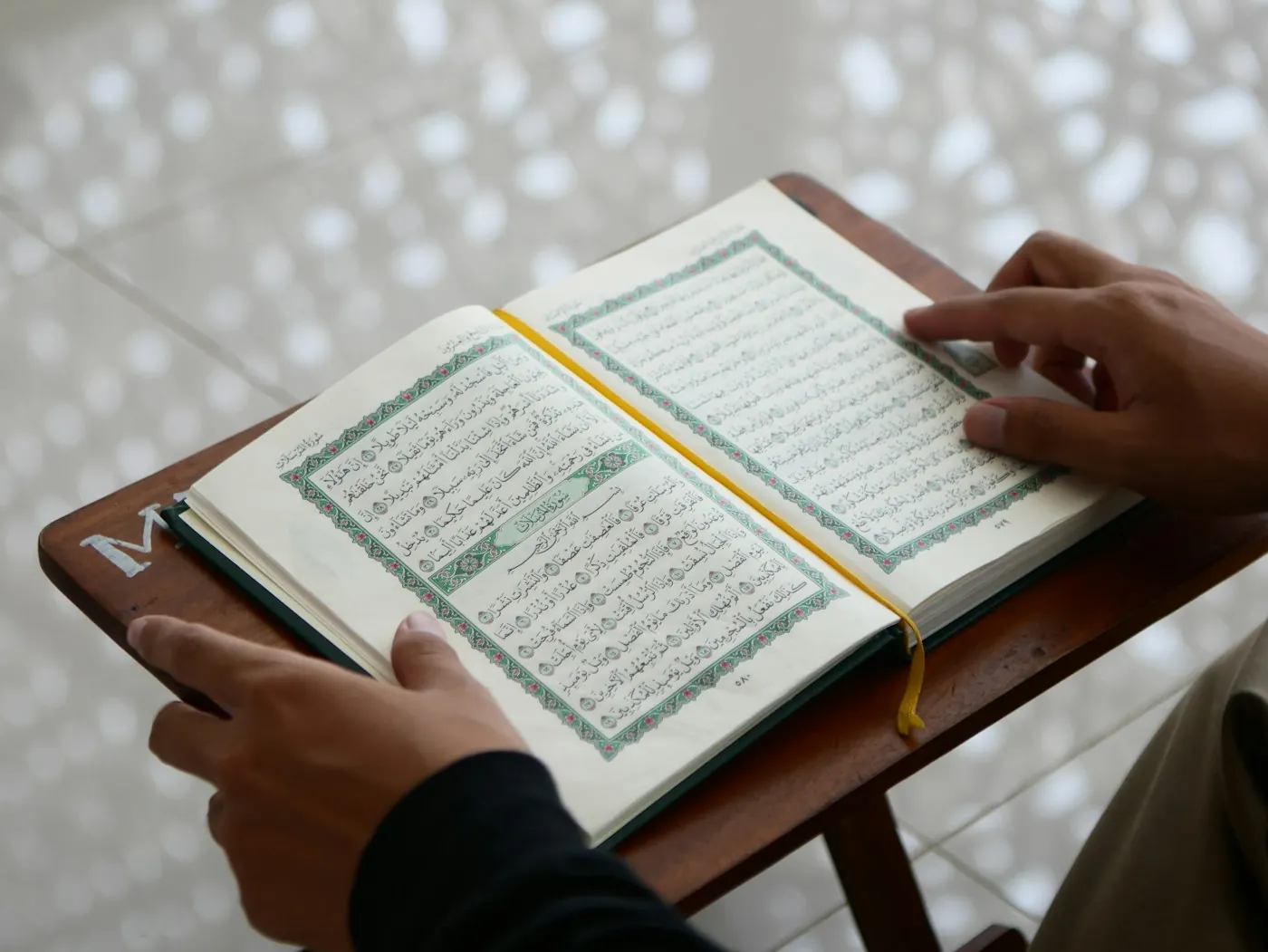 Student reciting the Quran online